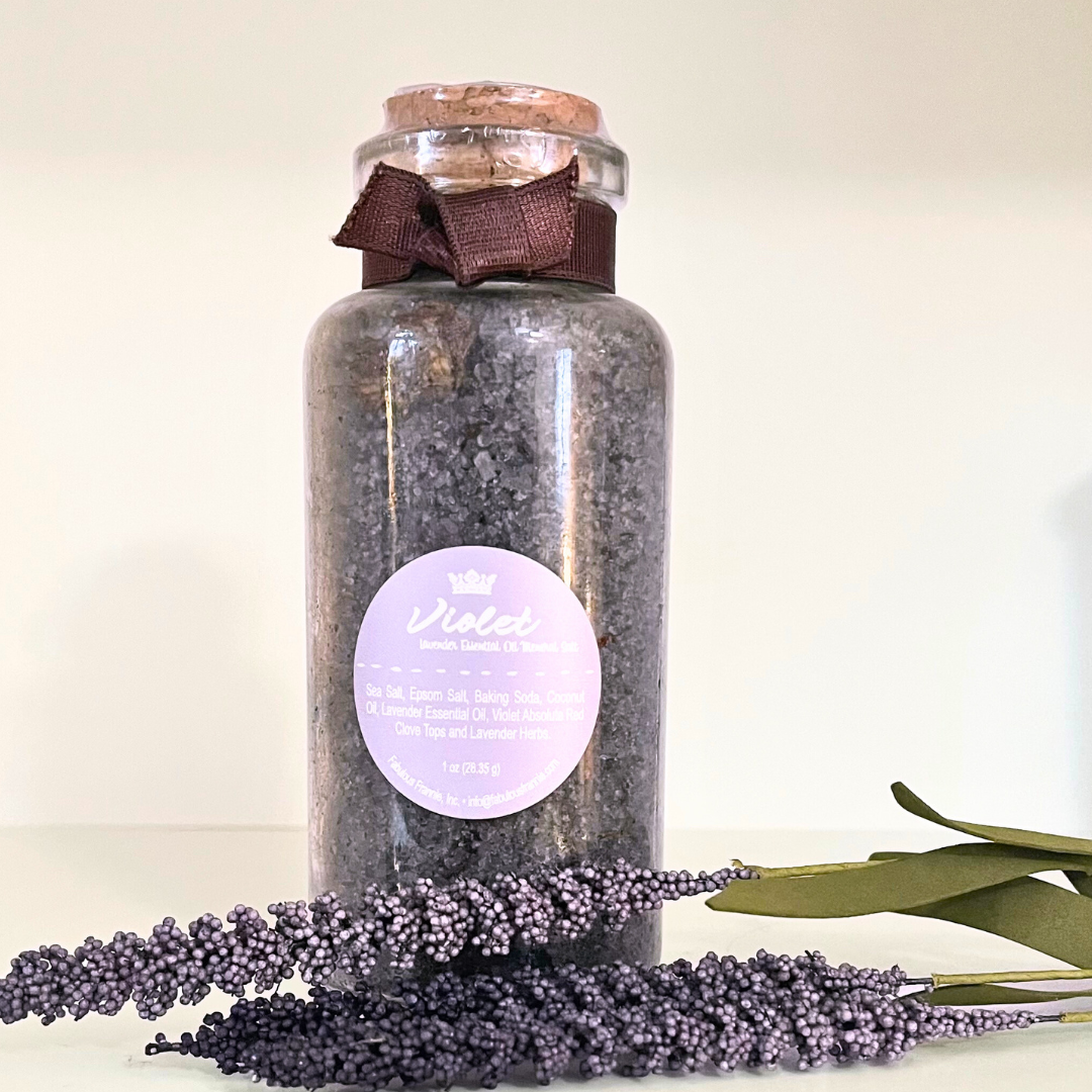 Purple Salts in a tall glass bottle.
