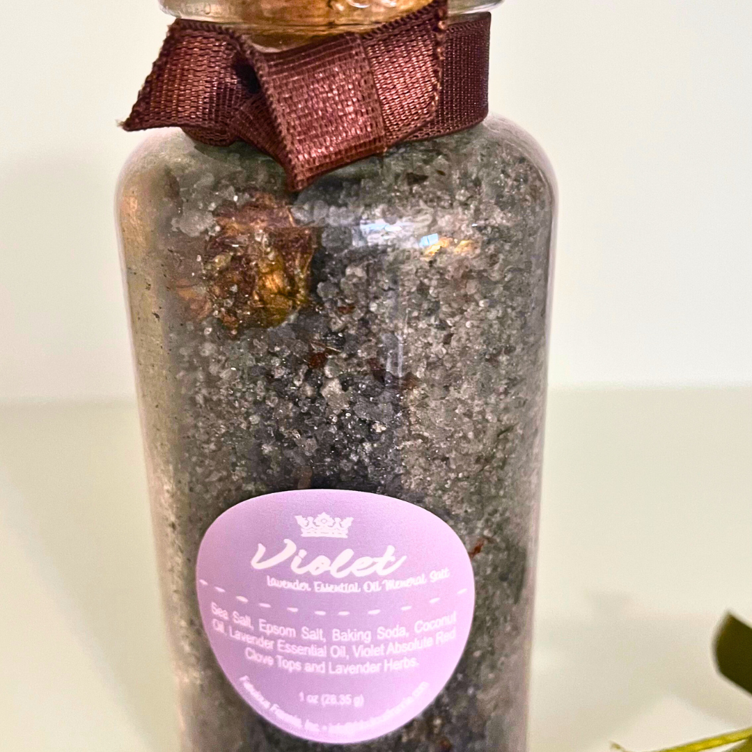 Purple Salts in a tall glass bottle.