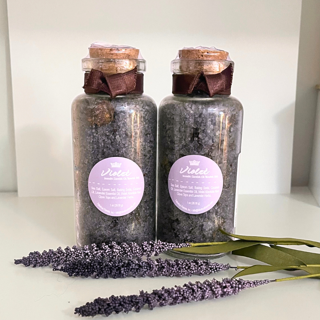 Purple Salts in a tall glass bottle.