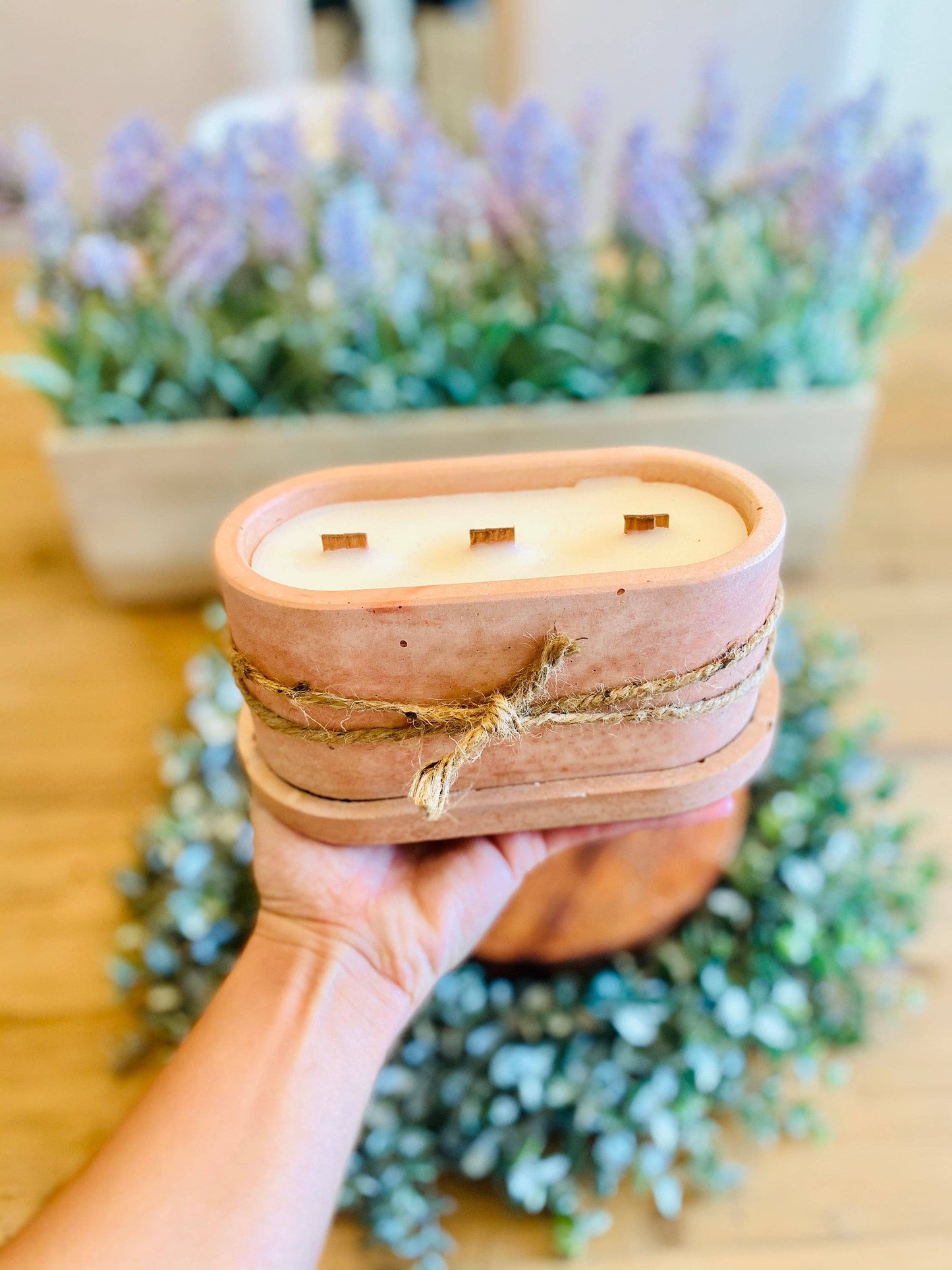 3-wooden wicks in a cement vessel